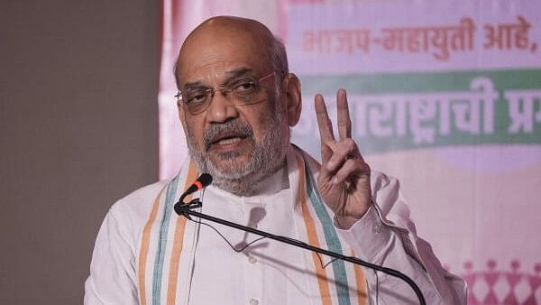 <div class="paragraphs"><p>Union Minister and BJP leader Amit Shah speaks during the release of party's manifesto for Maharashtra Assembly elections, in Mumbai, Sunday, Nov. 10, 2024. </p></div>