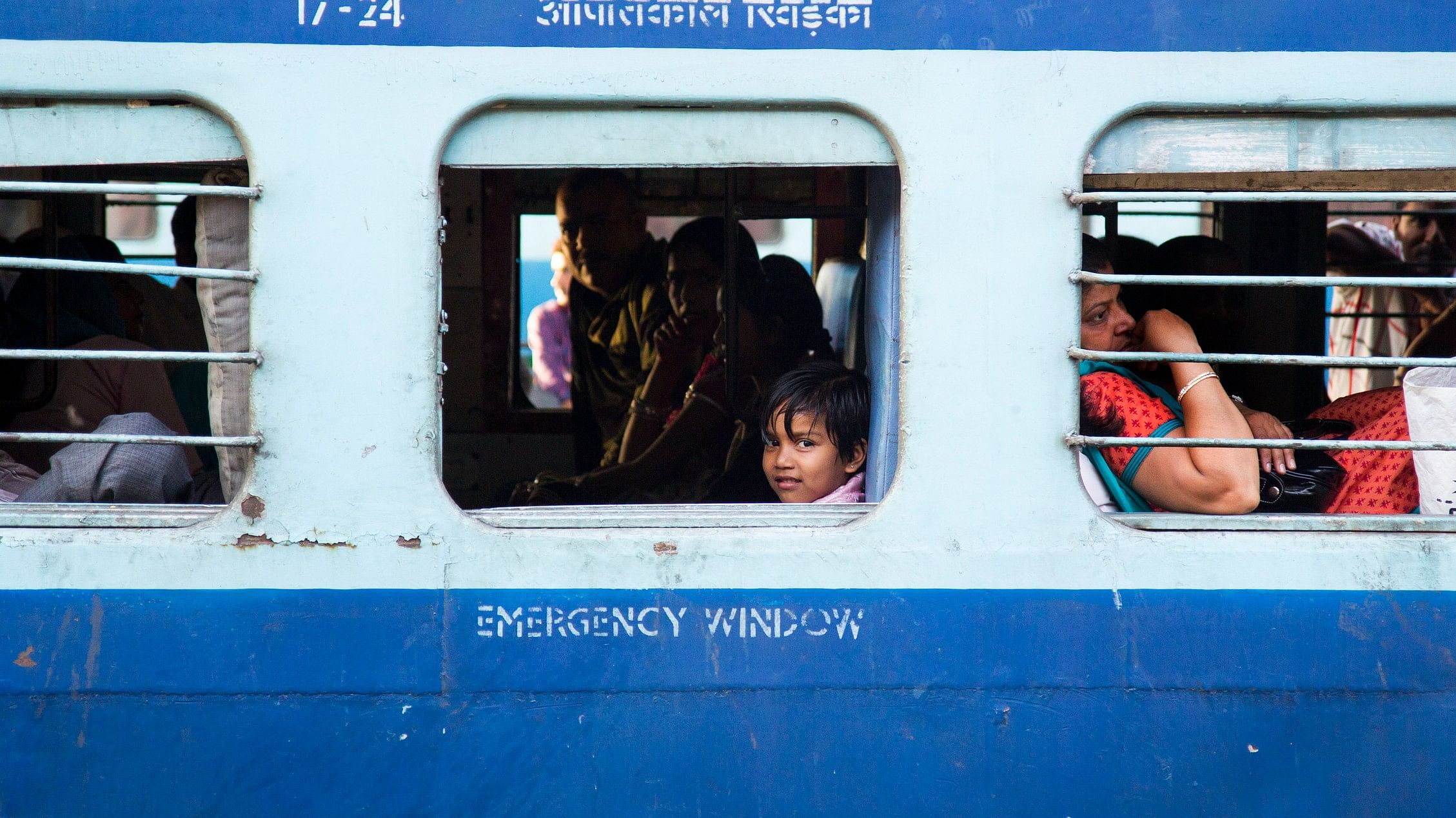 <div class="paragraphs"><p>A child look out of a window on a train. (Representative image)</p></div>