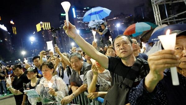 <div class="paragraphs"><p>File Photo: 30th anniversary of the crackdown of Beijing's Tiananmen Square in 1989, in Hong Kong.&nbsp;</p></div>