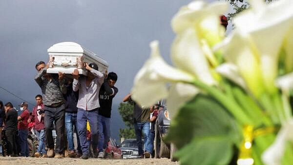 <div class="paragraphs"><p>Relatives carry a casket towards a truck after a wake for members of a merchant family from the community of Chautipan, who went missing at the end of October and whose remains were found in a van, in the village of Chautipan, on the outskirts of Chilpancingo, Guerrero state, Mexico.</p></div>