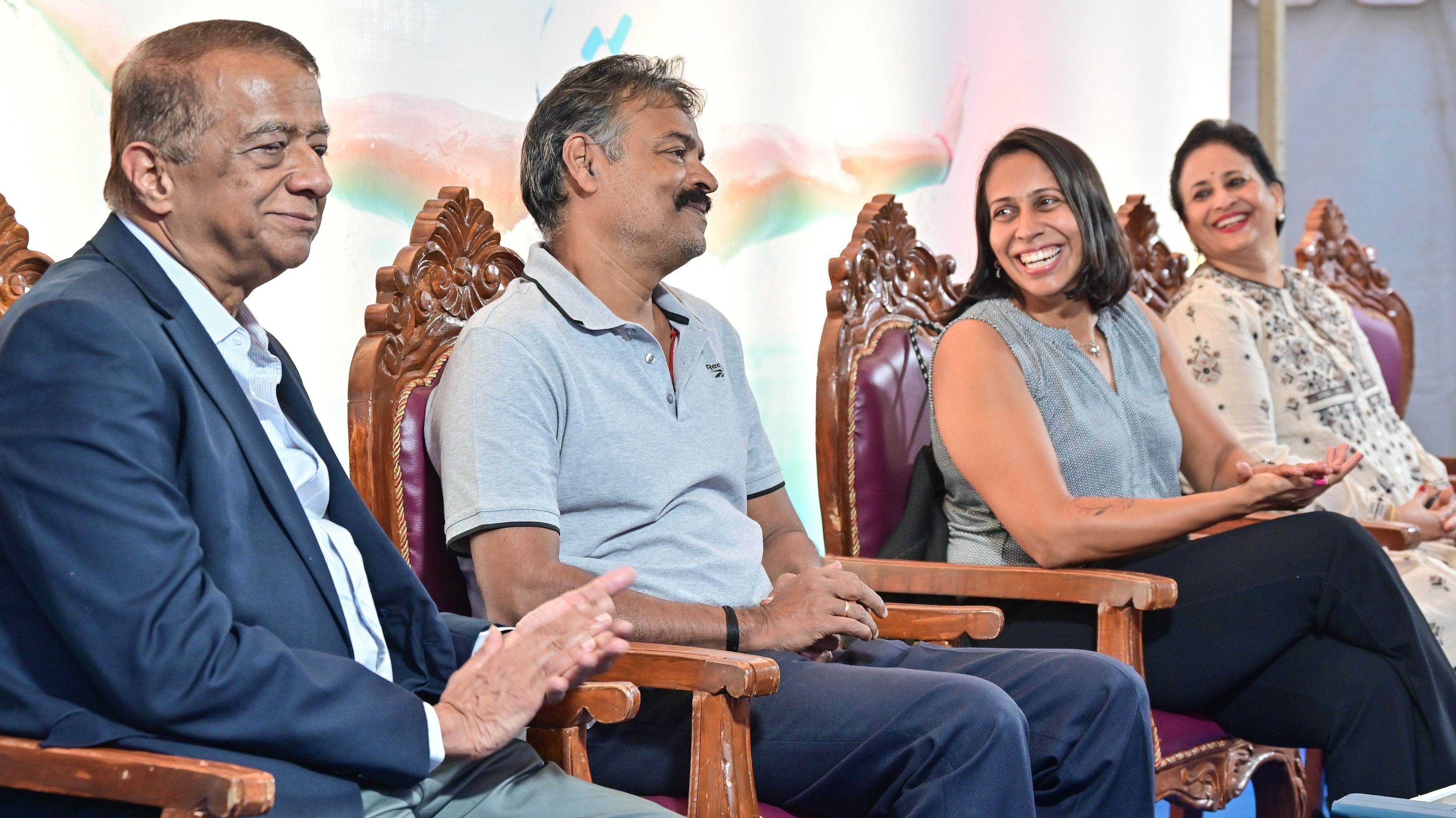 <div class="paragraphs"><p>Olympian Nisha Millet (second from right), ace swimming coach Pradeep Kumar (second from left) share a light moment with KN Tilak Kumar (left), Chairman of KN Guruswamy Education and Charitable Trust and Sujatha Tilak Kumar, Director of the Trust, during the inauguration of the 3rd edition of the All-India Nettakallappa Swimming Championships at the Nettakallappa Aquatic Centre in Bengaluru. </p></div>