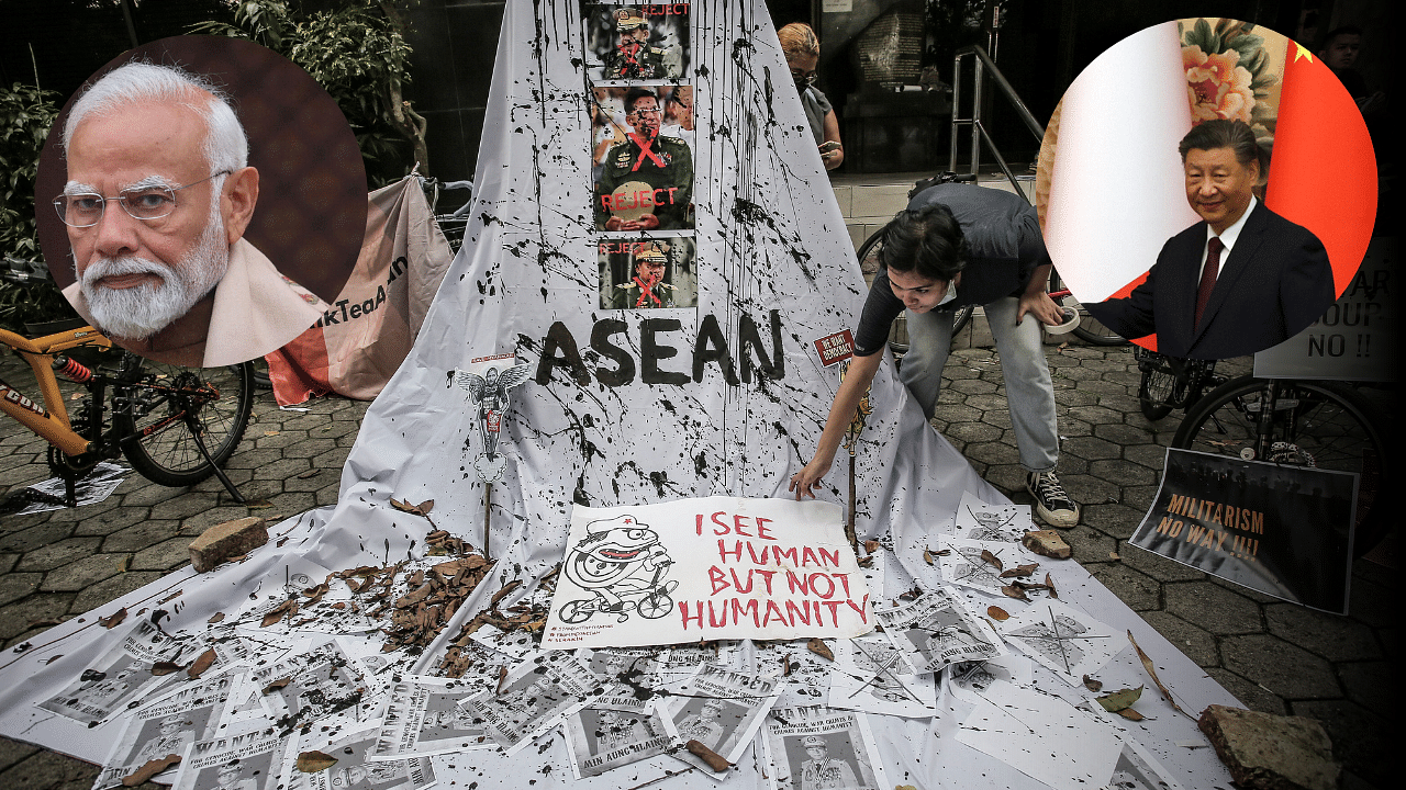 <div class="paragraphs"><p>A woman prepares a placard out of crossed out portraits of Myanmar's junta chief Senior General Min Aung Hlaing during protest against the military coup in Myanmar, in Jakarta. (Inset: Indian PM Narendra Modi (L); Chinese President Xi Jinping).</p></div>