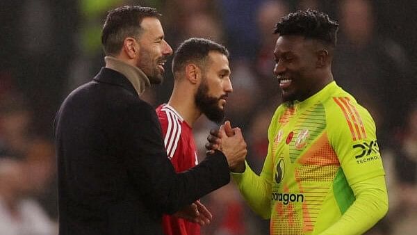 <div class="paragraphs"><p>Manchester United interim manager Ruud van Nistelrooy and Andre Onana celebrate after the match</p></div>