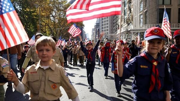 <div class="paragraphs"><p>Members of Boy Scouts of America attend the annual Veteran's Day Parade in New York City, US.</p></div>