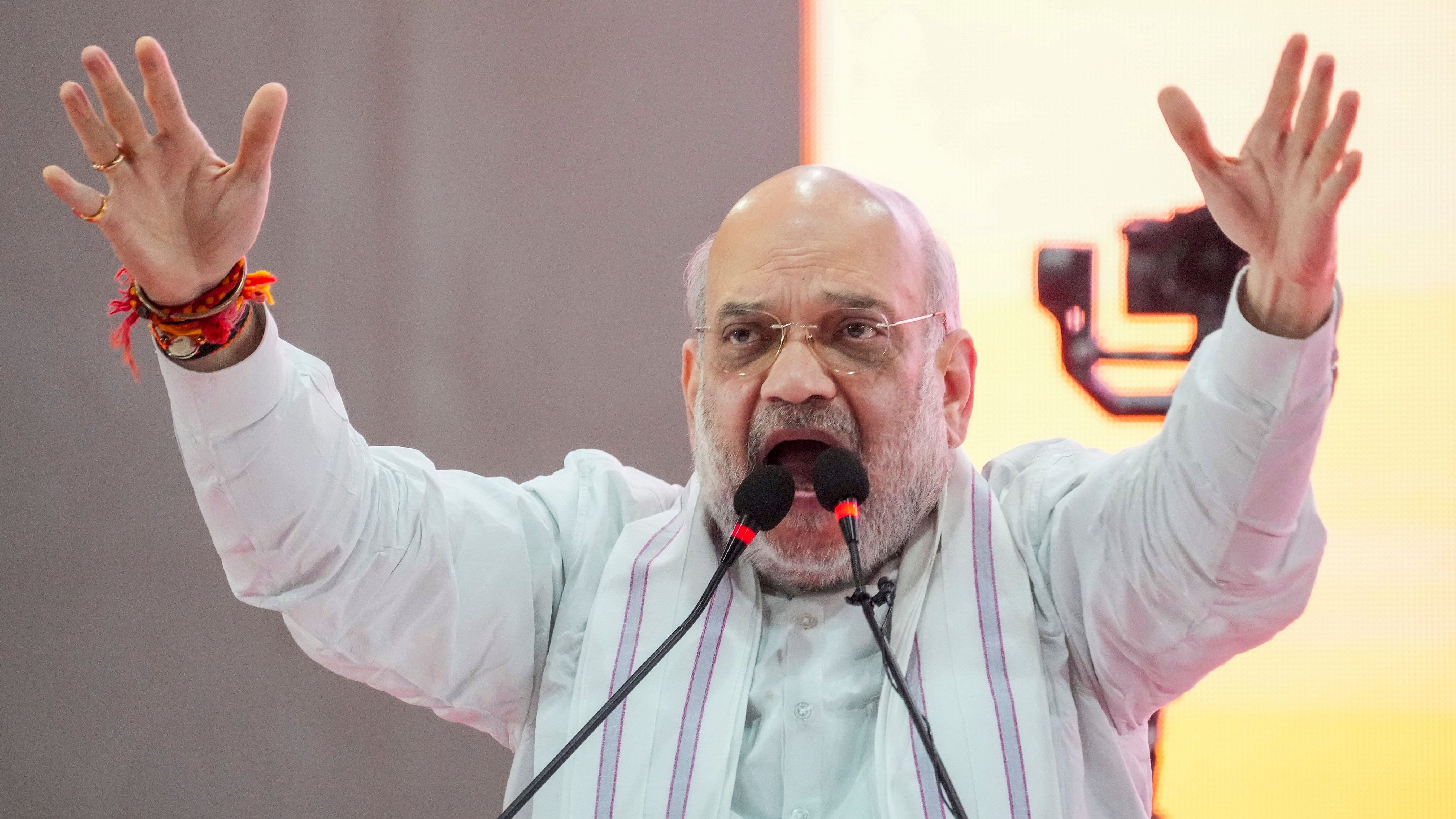 <div class="paragraphs"><p>Union Home Minister Amit Shah addresses a public meeting ahead of the Maharashtra Assembly elections, in Mumbai, Tuesday, Nov. 12, 2024. </p></div>