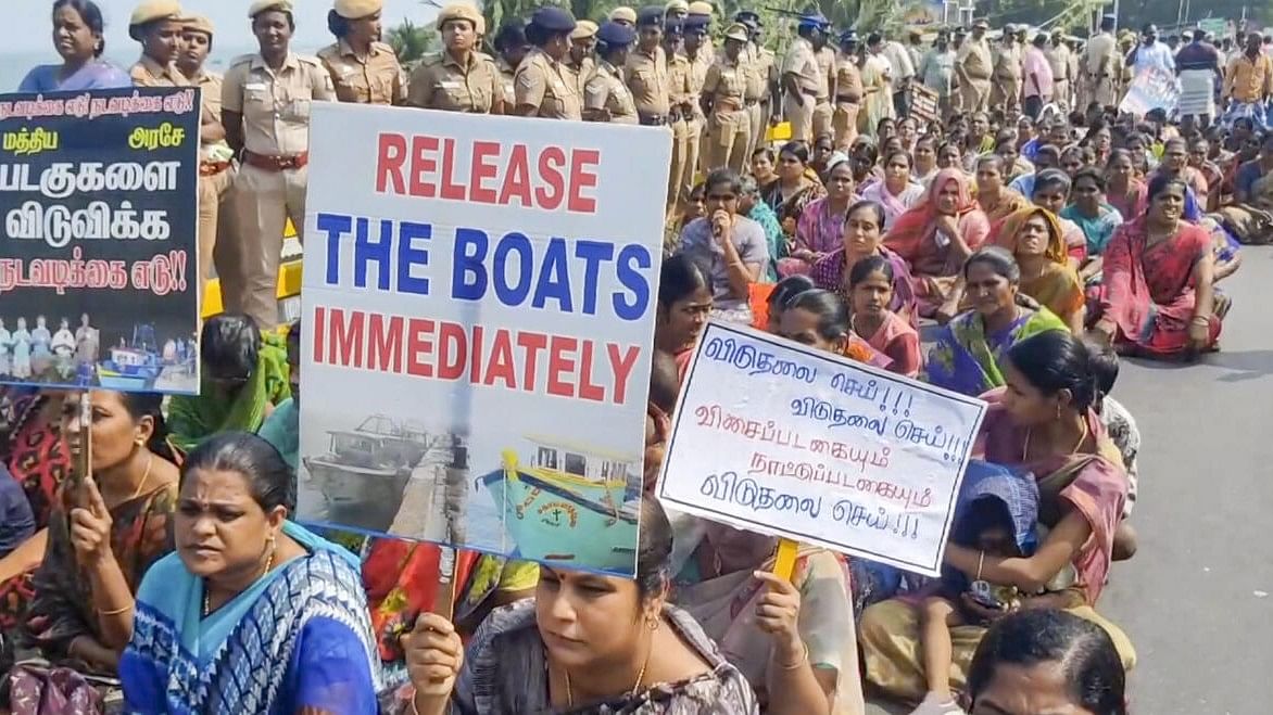 <div class="paragraphs"><p> Fishermen stage a protest demanding release of Indian fishermen who were detained by the Sri Lankan Navy, at Pamban in Rameswaram, Tuesday, Nov. 12, 2024. 12 fishermen and their boats were apprehended by the Sri Lankan Navy on Tuesday allegedly for crossing the international maritime border.</p></div>