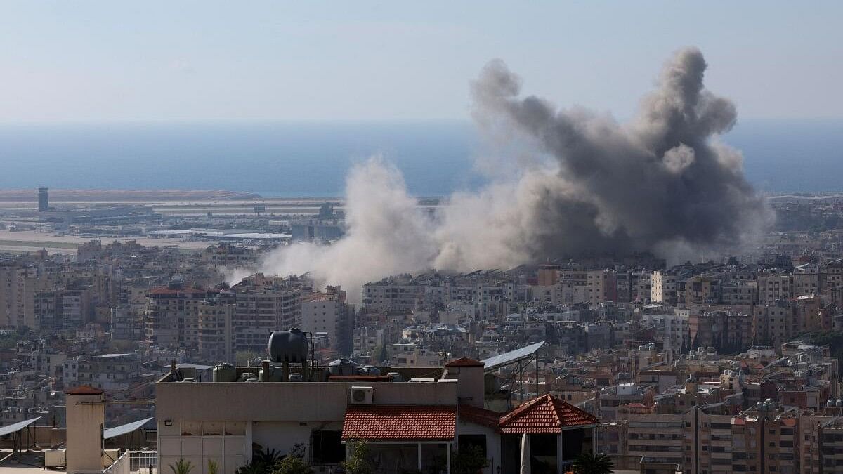 <div class="paragraphs"><p>Smoke billows over Beirut's southern suburbs near Beirut-Rafic Hariri International Airport after an Israeli strike.</p></div>