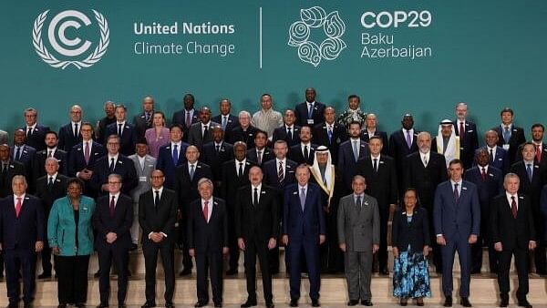 <div class="paragraphs"><p>World leaders attending the United Nations climate change conference, known as COP29, pose for a family photo in Baku, Azerbaijan.</p></div>