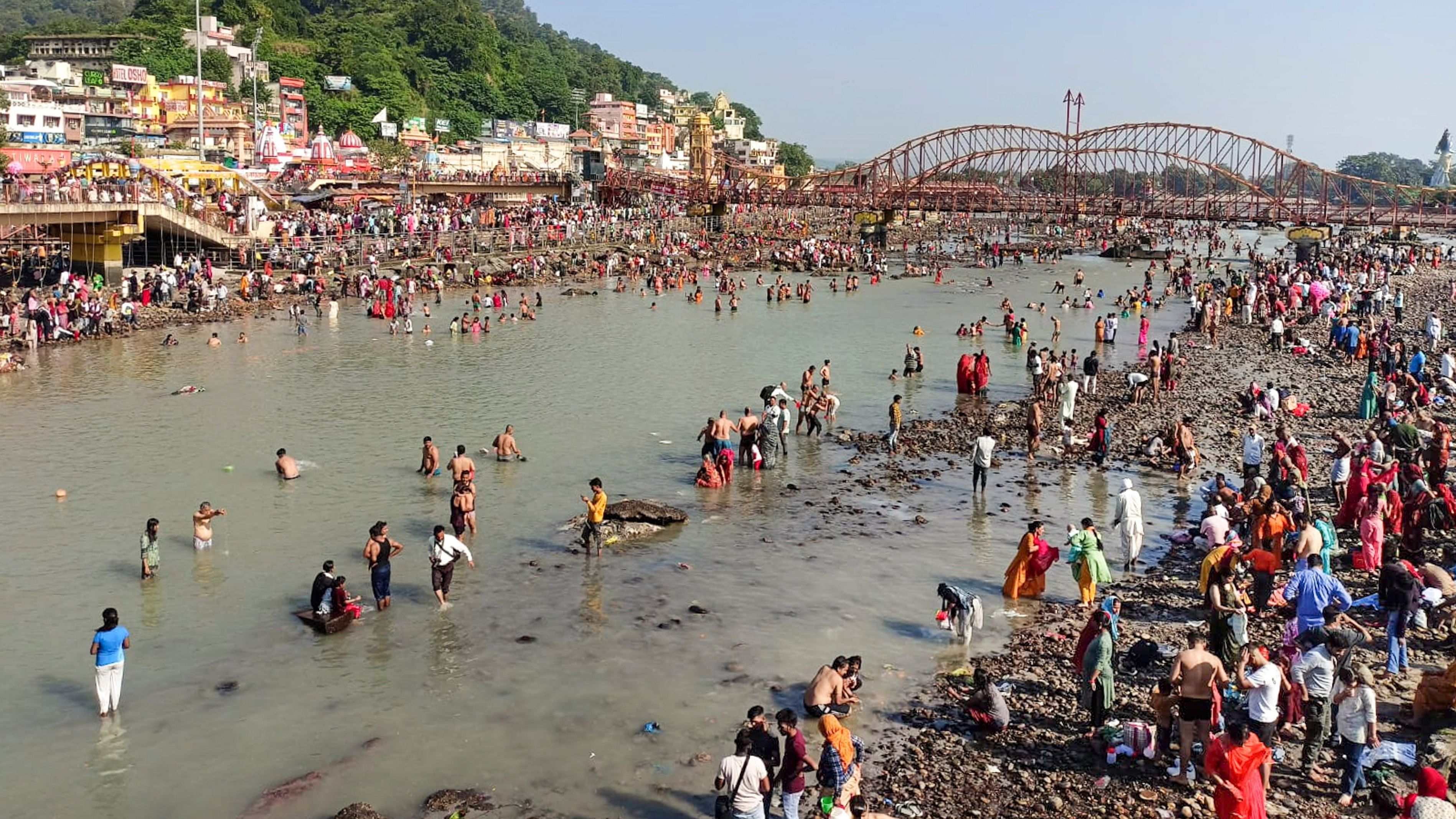 <div class="paragraphs"><p> Devotees take bath at Har Ki Pouri, in Haridwar, Monday, Oct. 11, 2024.  </p></div>