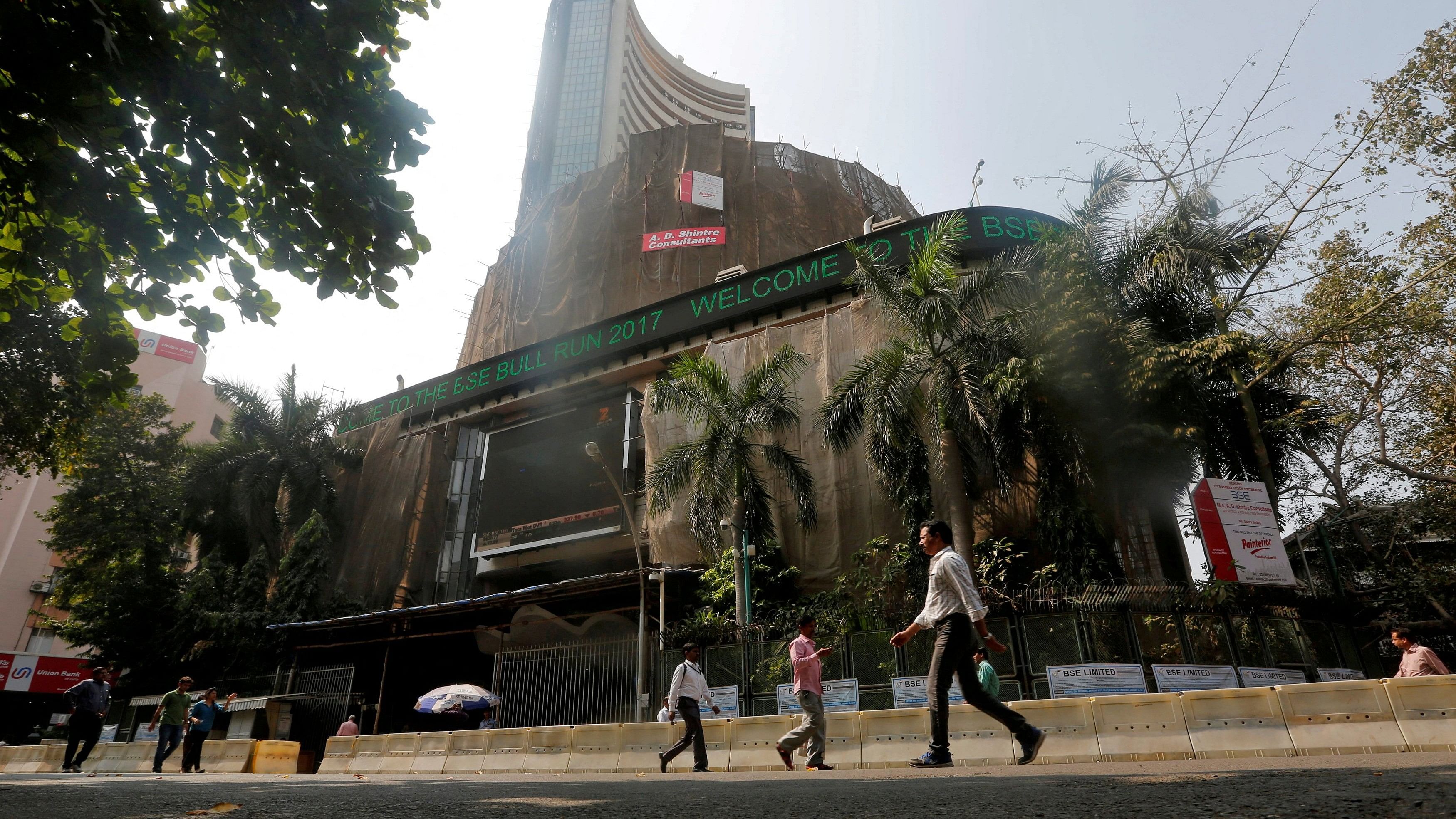 <div class="paragraphs"><p>File Photo: People walk past the Bombay Stock Exchange  building in Mumbai, India.</p></div>