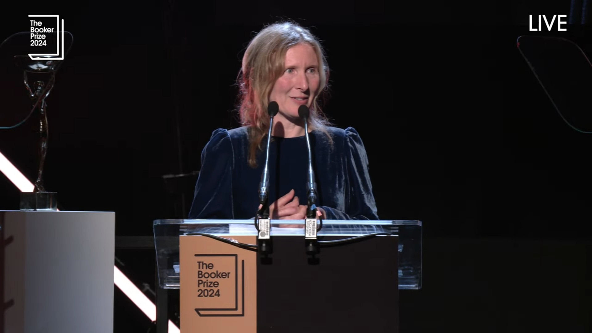 <div class="paragraphs"><p>Screenshot of Samantha Harvey giving a speech after winning the Booker Prize. </p></div>