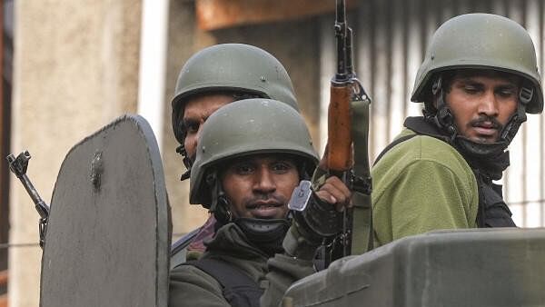 <div class="paragraphs"><p>Security personnel during an encounter with terrorists at Zabarwan forest area on the outskirts of Srinagar.</p></div>