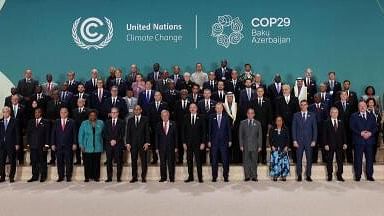 <div class="paragraphs"><p>World leaders attending the United Nations climate change conference, known as COP29, pose for a family photo in Baku, Azerbaijan.</p></div>