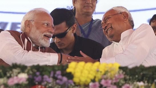 <div class="paragraphs"><p>Prime Minister Narendra Modi with Bihar Chief Minister Nitish Kumar during the inauguration of multiple developmental projects, in Darbhanga, Bihar.</p></div>