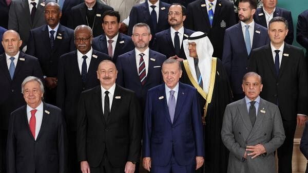 <div class="paragraphs"><p>World leaders attending the United Nations climate change conference, known as COP29, pose for a family photo in Baku, Azerbaijan.</p></div>