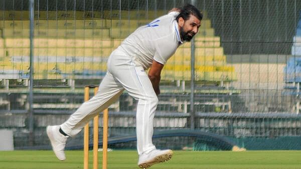 <div class="paragraphs"><p>Bengal’s Mohammed Shami bowls during the first day of the Ranji Trophy tie against Madhya Pradesh at the Holkar Cricket Stadium in Indore on Wednesday.</p></div>