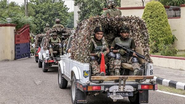 <div class="paragraphs"><p>Security personnel arrive at the Police headquarters, in Jammu. Representative image.</p></div>