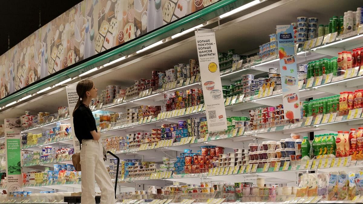 <div class="paragraphs"><p>A customer shops at a supermarket in Saint Petersburg.</p></div>