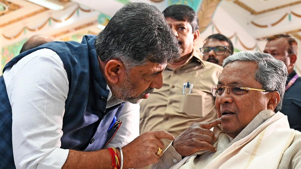 <div class="paragraphs"><p>Karnataka Deputy CM D K Shivakumar with CM Siddaramaiah</p></div>