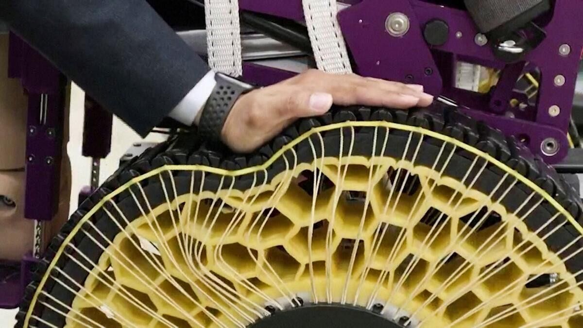 <div class="paragraphs"><p>A Korea Institute of Machinery and Materials researcher presses down on a stiffness-variable morphing wheel to check its stiffness in Daejeon.</p></div>