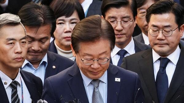 <div class="paragraphs"><p>South Korea's main opposition Democratic Party Leader Lee Jae-myung reacts as he leaves the court after being convicted on charges of violating the election law, in Seoul, South Korea, November 15, 2024. </p></div>