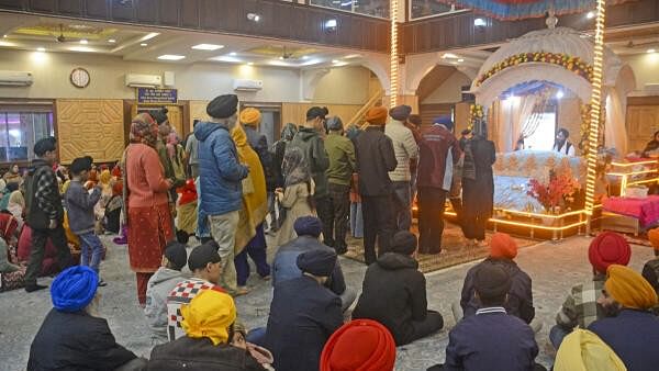 <div class="paragraphs"><p>Devotees pay obeisance at the Chatti Padshahi Gurudwara during Guru Nanak Jayanti celebration, in Srinagar, Friday, Nov. 15, 2024.</p></div>