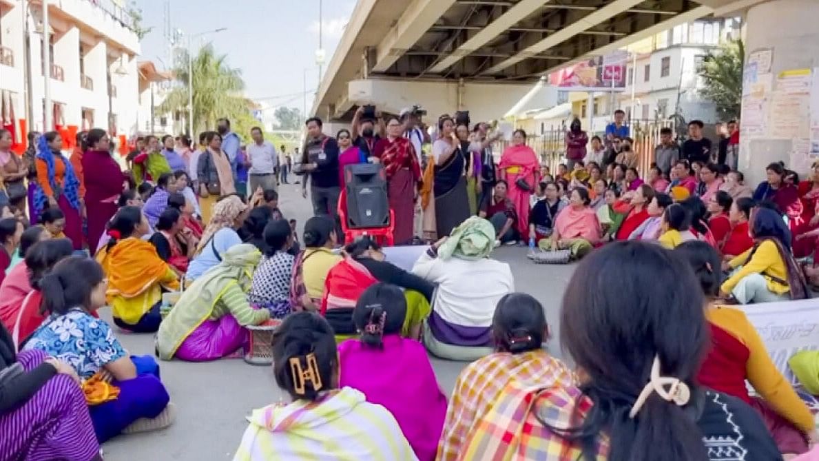 <div class="paragraphs"><p>Women protest at Ima Market after three bodies suspected to be of six persons missing were found from Jiribam district, in Imphal, Manipur, Saturday, Nov. 16, 2024.</p></div>