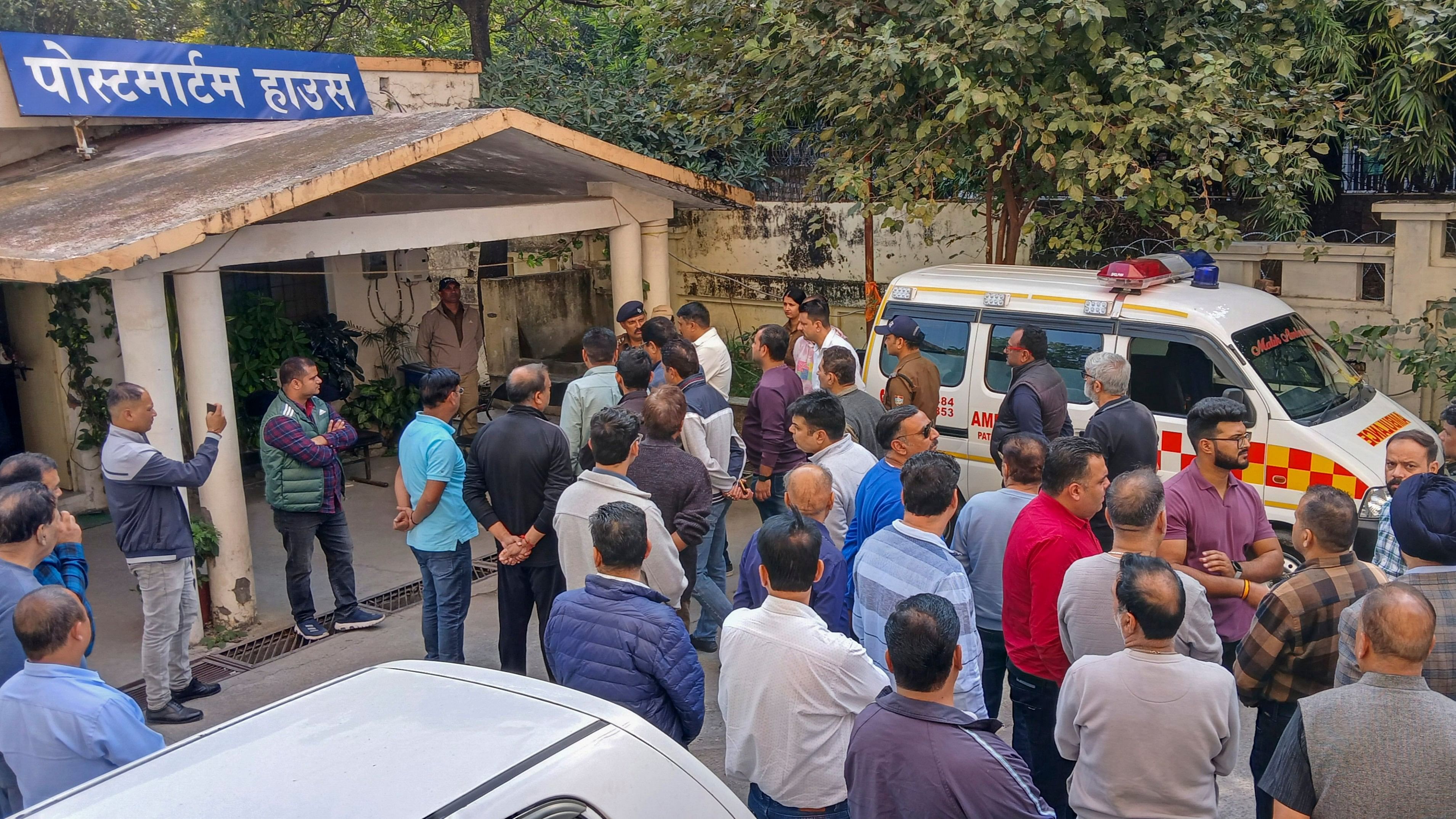 <div class="paragraphs"><p>Relatives of the victims and police personnel at the mortuary of Coronation Hospital, following a road accident involving a car and a truck, in Dehradun, Tuesday, Nov. 12, 2024. At least 6 people were killed and one other sustained injuries in the accident, according to officials. </p></div>