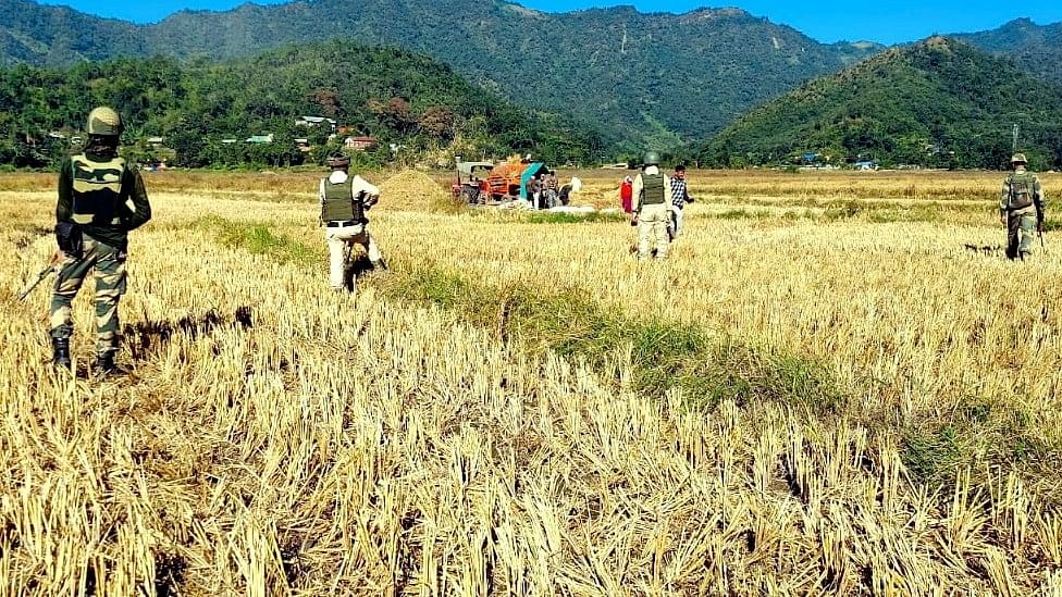 <div class="paragraphs"><p>Security personnel conduct searches in a sensitive area of Manipur. </p></div>