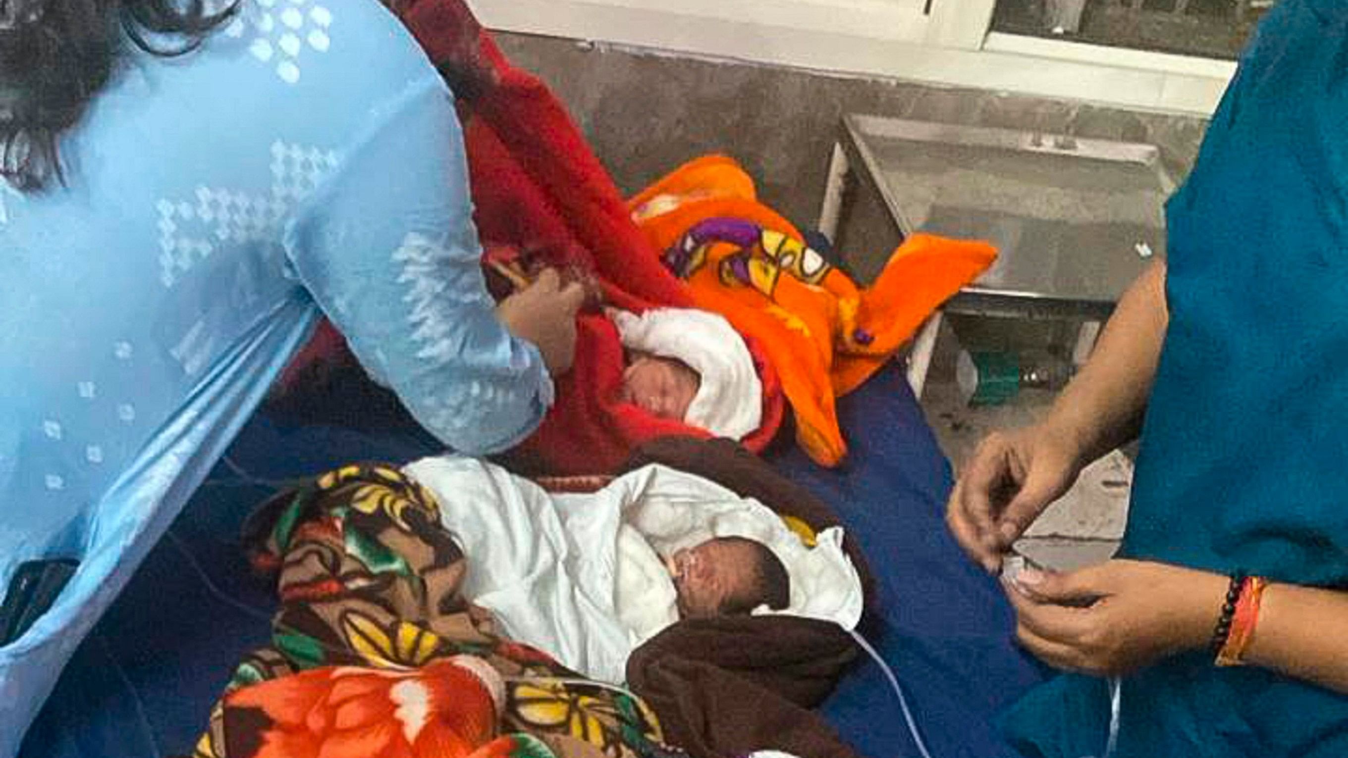 <div class="paragraphs"><p>Newborn babies after being safely rescued following a fire that broke out in the Neonatal Intensive Care Unit (NICU) of the Maharani Laxmi Bai Medical College, in Jhansi district, early Saturday.</p></div>