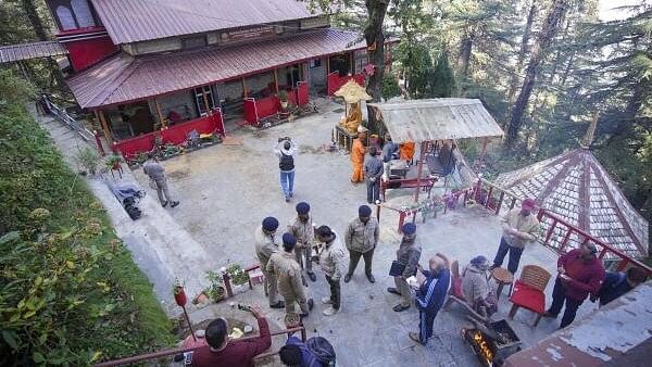 <div class="paragraphs"><p>Police personnel investigate following a dispute between two Hindu groups on the premises of the Ramakrishna Mission Ashram, in Shimla.&nbsp;</p></div>