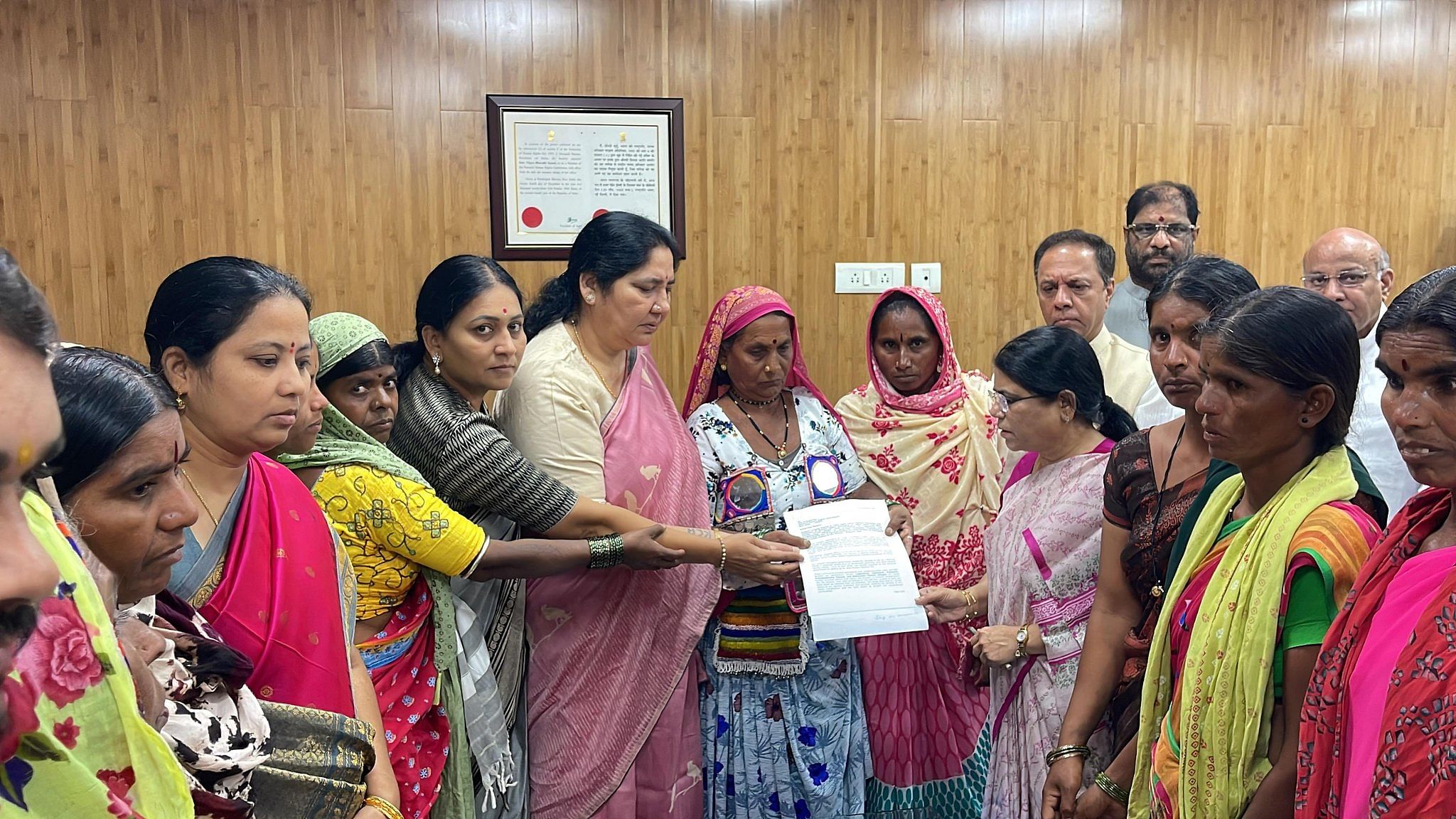 <div class="paragraphs"><p>Residents of Lagacharla village,  submitting a petition to Chairperson of the National Human Rights Commission in Delhi </p></div>