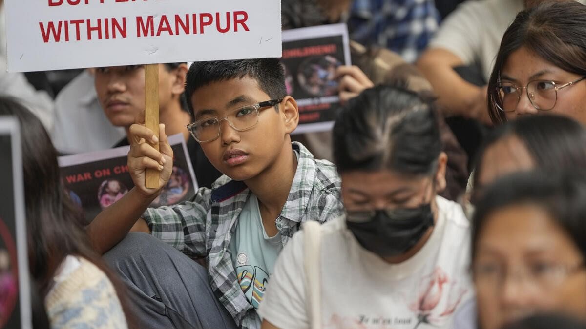 <div class="paragraphs"><p> People stage a protest after bodies of six people from the Meitei community were found, days after they were taken hostage by suspected Kuki insurgents in Manipur, at Jantar Mantar, in New Delhi.</p></div>