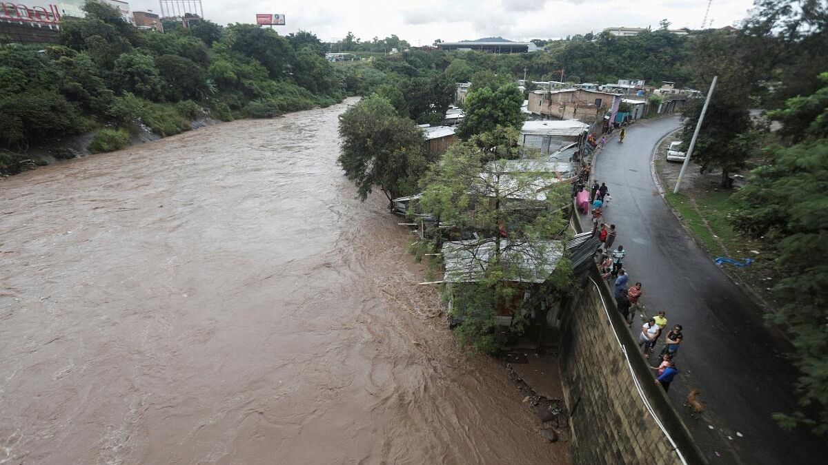 <div class="paragraphs"><p>A view shows the current of the Choluteca River, which exceeds its levels during the aftermath of tropical storm Sara, in Tegucigalpa, Honduras, November 17, 2024.</p></div>