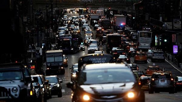 <div class="paragraphs"><p>Traffic is pictured at twilight along 42nd St. in the Manhattan borough of New York</p></div>