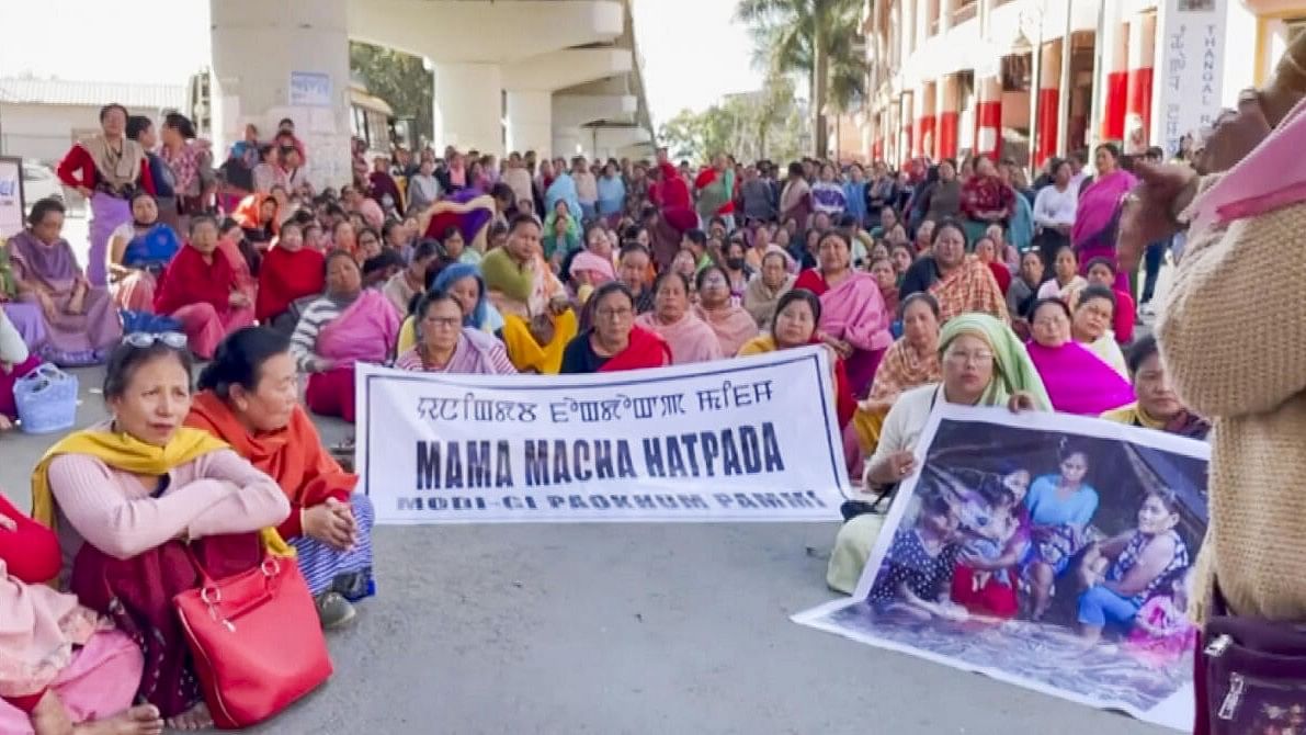 <div class="paragraphs"><p>Women protest at Ima Market after three bodies suspected to be of six persons missing were found from Jiribam district, in Imphal, Manipur, Saturday, Nov. 16, 2024.</p></div>