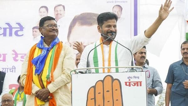 <div class="paragraphs"><p>Telangana Chief Minister A Revanth Reddy addresses a public meeting ahead of the Maharashtra Assembly elections, at Rajura Assembly constituency in Chandrapur district, Maharashtra.</p></div>