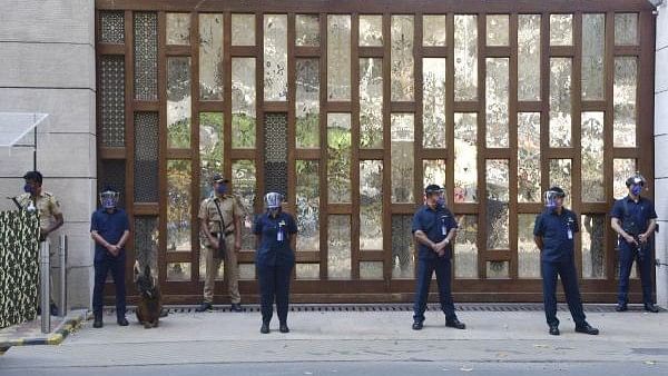 <div class="paragraphs"><p>File photo of police personnel guard outside industrialist Mukesh Ambani's residence Antilla.&nbsp;</p></div>