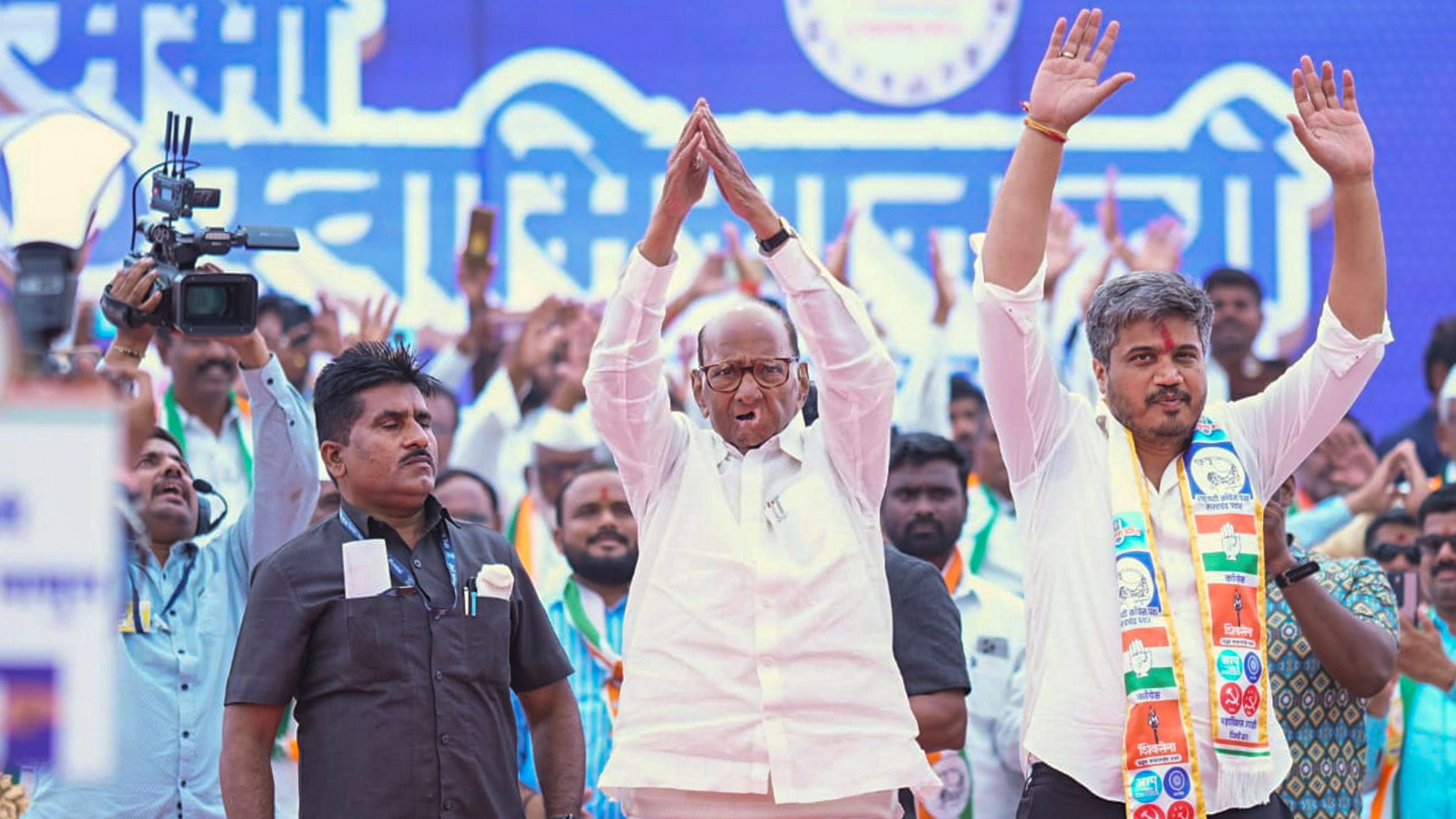 <div class="paragraphs"><p>NCP (SP) chief Sharad Pawar with party candidate Rohit Pawar during a public meeting ahead of Maharashtra Assembly elections, in Karjat</p></div>