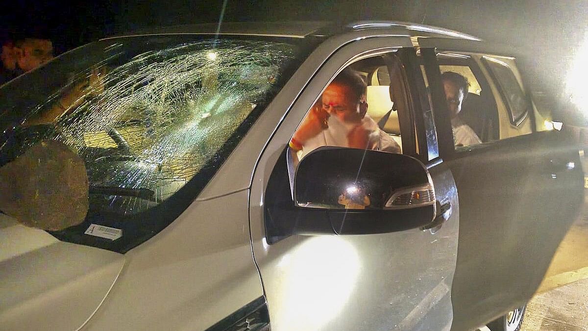 <div class="paragraphs"><p>Damaged windshield of the car of former Maharashtra minister and NCP (SP) leader Anil Deshmukh after stones were hurled at the car, in Nagpur district, Monday, Nov. 18, 2024. Deshmukh suffered injuries in the incident.</p></div>