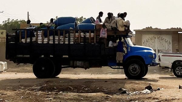 <div class="paragraphs"><p>Families flee RSF advances in Sudan's El Gezira state, on Sennar Road in the city of al-Dinder, Sennar state, Sudan. Representative image.</p></div>