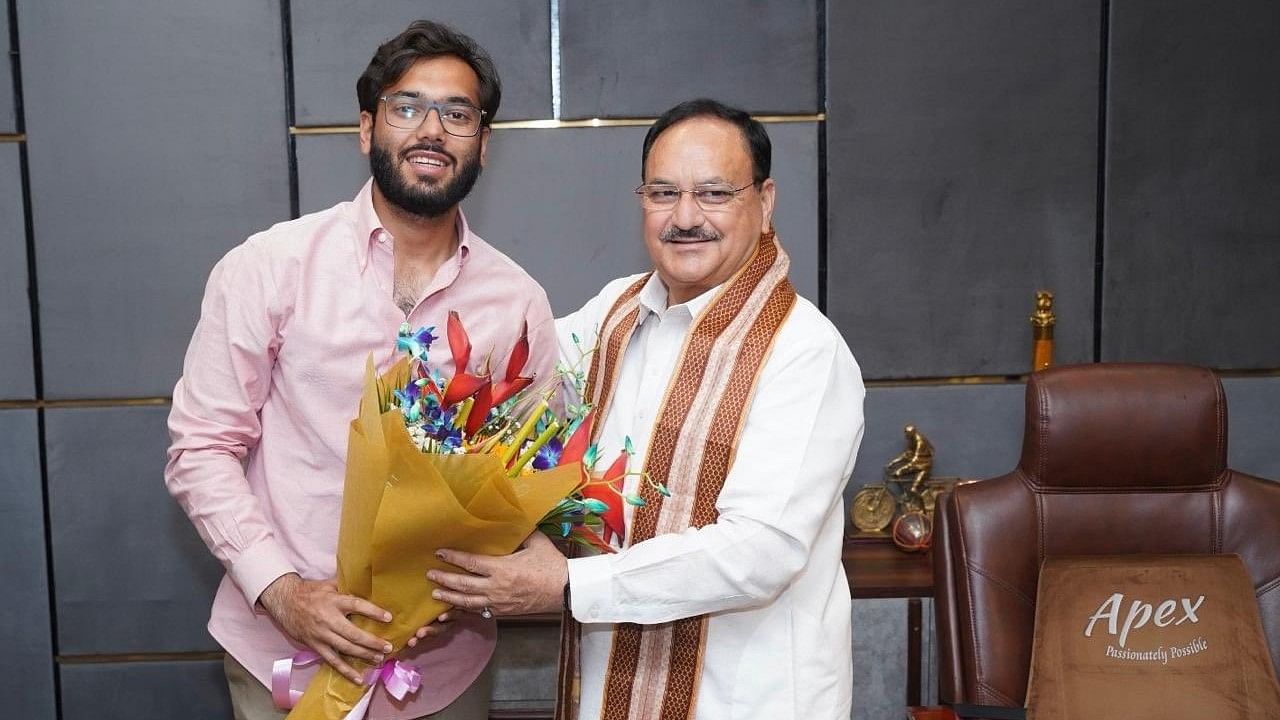 <div class="paragraphs"><p>Former MLA from Gagret Chaitanya Sharma with BJP chief JP Nadda</p></div>