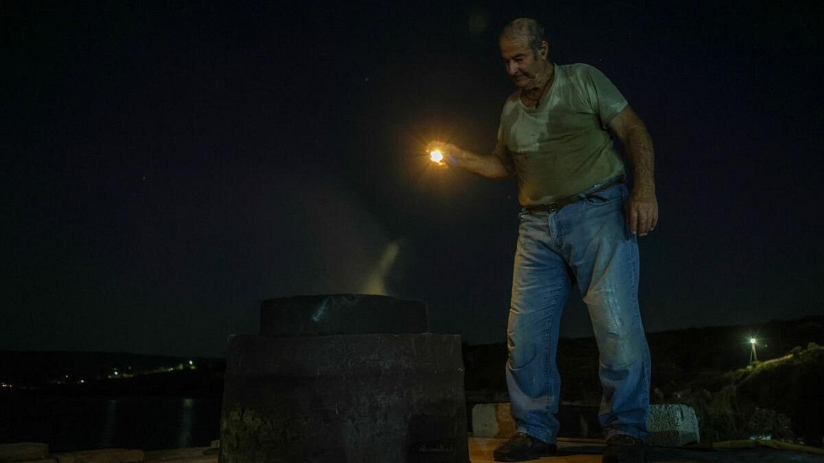 <div class="paragraphs"><p>Nikos Kouvdis, 70, works in his pottery workshop in Agios Stefanos village, near Mandamados on the Greek island of Lesbos, Greece, July 20, 2024. His family’s dedication to preserving the craft was recently honored with inclusion in UNESCO’s National Inventory of Intangible Cultural Heritage. </p></div>