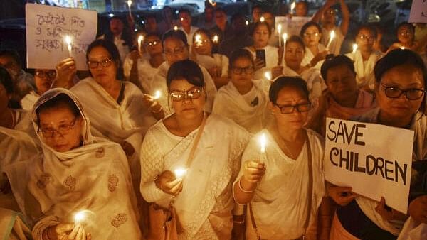 <div class="paragraphs"><p>Members of Manipuri Sahitya Parishad Assam take part in a protest against the recent killing of three women and three children in Manipur's Jiribam, in Guwahati.</p></div>