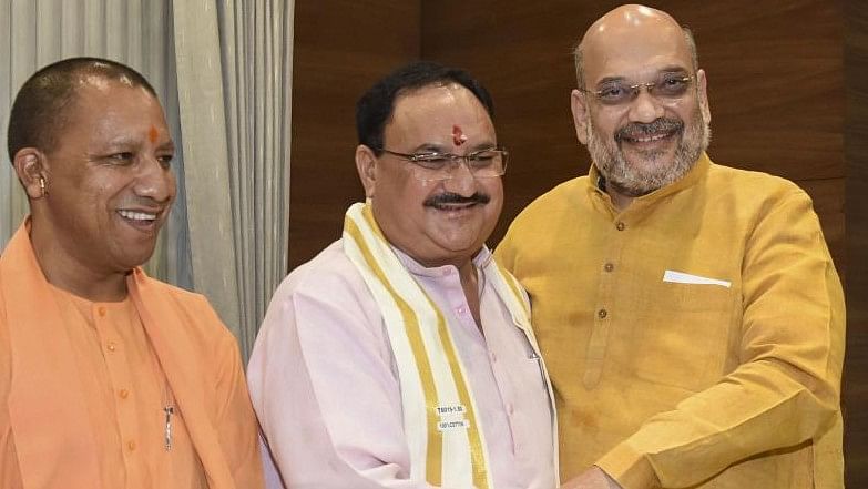 <div class="paragraphs"><p>BJP leaders Yogi Adityanath, J P Nadda, and Amit Shah</p></div>