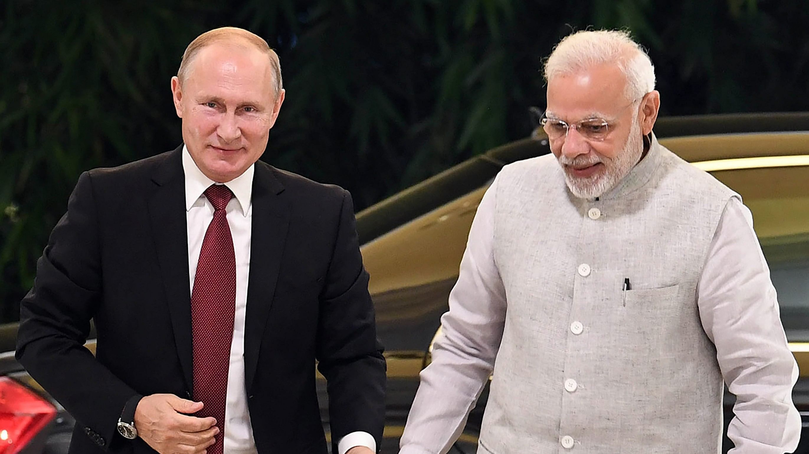 <div class="paragraphs"><p>File image of Russian President Vladimir Putin and PM Narendra Modi.</p></div>