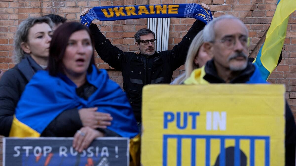 <div class="paragraphs"><p>Protesters gather to participate in a demonstration marking the upcoming anniversary of 1,000 days since Russia's invasion of Ukraine.</p></div>