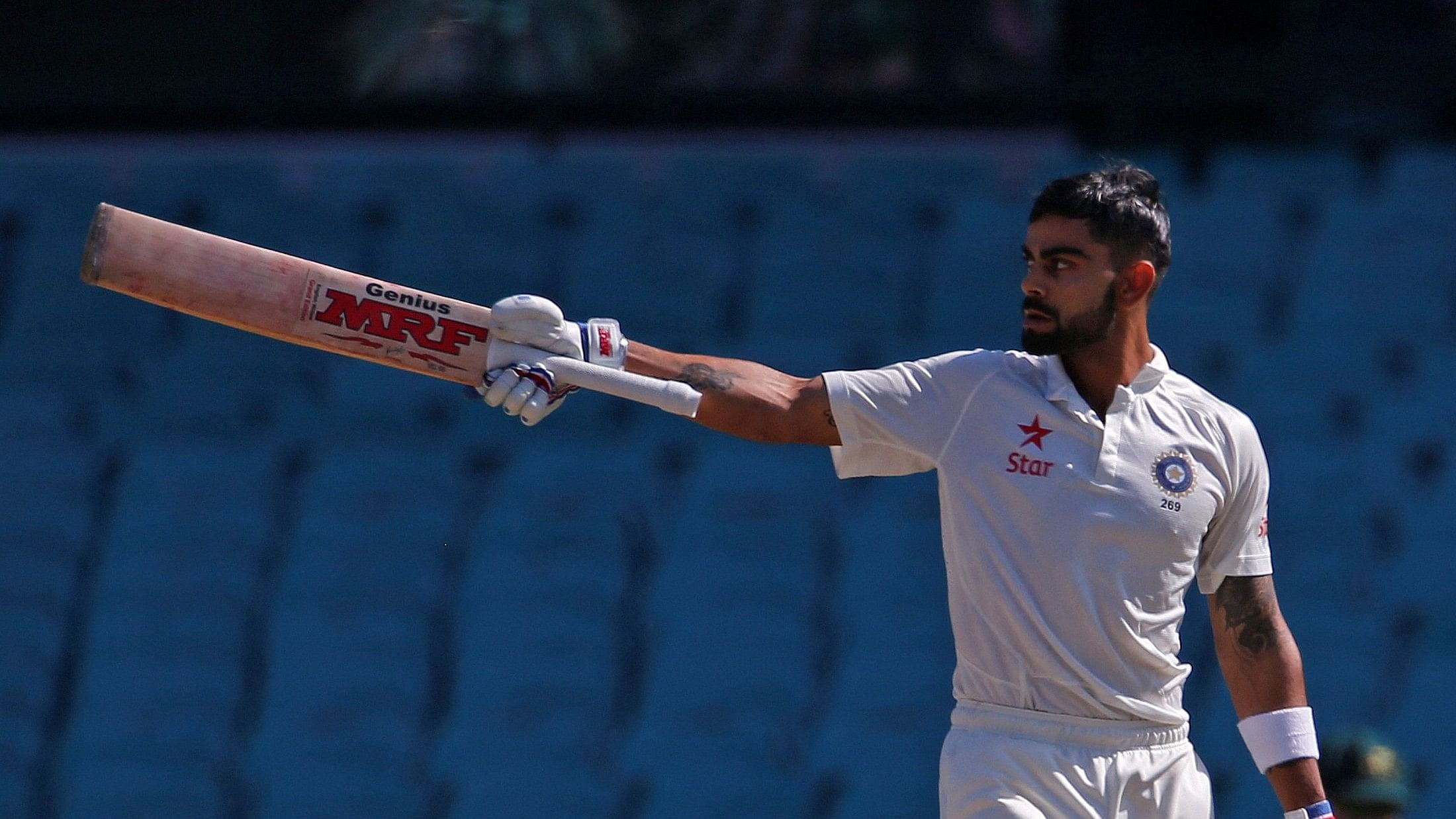 <div class="paragraphs"><p>Virat Kohli celebrates a test century against Australia at the Sydney Cricket Ground.</p></div>