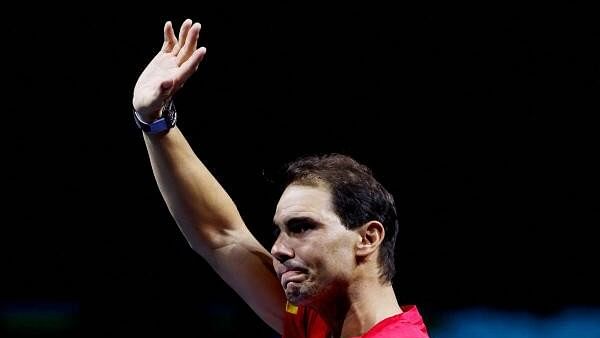 <div class="paragraphs"><p>Davis Cup Finals - Quarter Final - Netherlands v Spain - Palacio de Deportes Jose Maria Martin Carpena Arena, Malaga, Spain - November 20, 2024 - Spain's Rafael Nadal waves at fans during a tribute to his career after The Netherlands eliminated Spain.</p></div>