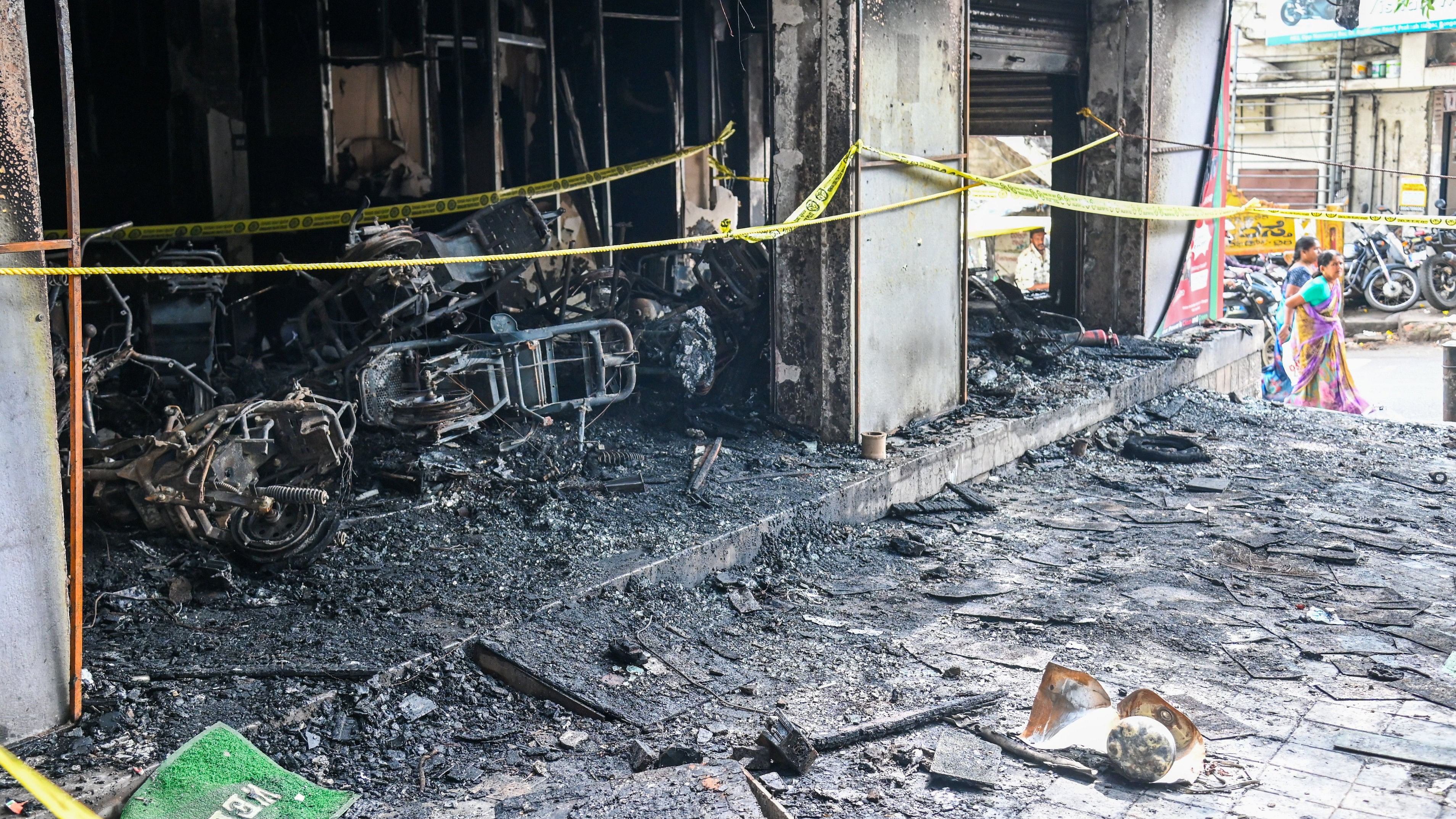 <div class="paragraphs"><p>The EV scooter showroom that was gutted on Tuesday, on Rajkumar Road in Rajajinagar. </p></div>